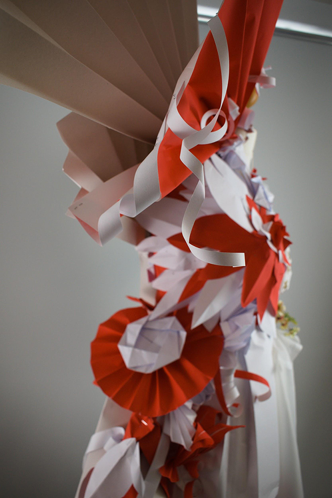 A textiles project from college, incorporating traditional pleating and origami techniques when using paper instead of fabric to make a dress.